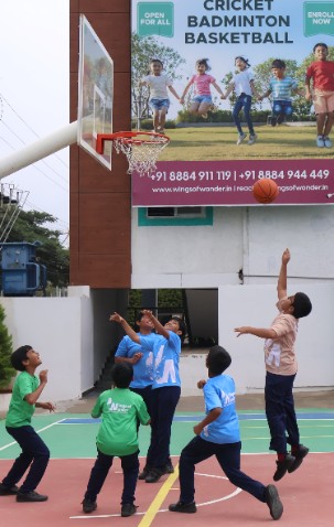 Students playing basketball
